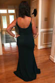 Material is perfect. Not see through (on green dress). It has a liner so that the dress can just hugs all the curves without clinging to skin. It shows just enough cleavage. I received many compliments from many strangers. I wore it to a black tie wedding. I chose green to be just a little different. Depending on the lighting the Forest Green can have a marine blue tone to it (mainly in sunlight). I had to get it hemmed because I'm 5'3". I would also recommend getting a bustle hook on it as the bottom has a train. When I got it hemmed, she did the front only. She talked me into keeping the train. I just wish I would have had her make a bustle for it. Fortunately my mom can sew and she sewed two hook and eye bustles
as best she could quickly for me. The liner would need the bustle too. But the dress was a show stopper for sure (husband and all). - Nicole C.