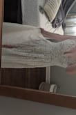 It fits my body perfectly - I couldn't believe it. I read reviews and took the advice to order a size smaller so I got a small. I cannot get over how perfect it fits. - April K.