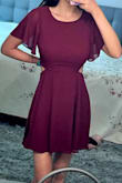 I first ordered a XS (since I'm usually an XS) as I have the lengthier version of this dress in an XS, but it was too tight up top & very very short. So, I switched to the S and it was perfect! Just be careful if it's windy. I was looking for a dress with sleeves, that would "hide" my cleavage, but still give me shape. I loved the cut outs! If you have more of a booty (I don't), you might want to size up as it will probably be too short! Wish I took more pics of me wearing it before we got too tipsy at the wedding, so sorry for the bad photo. In the solo photo I was trying it on and didn't have anyone to zip me up, so it doesn't look the same fit there. Oh ya, you WILL need someone to zip up the back/top for you--heads up! - Jamie M.
