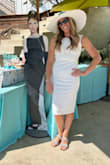 The back is sooo flattering! I received a lot of compliments on the back of the dress. I was nervous about no bra, but just rocked it. I forgot to order pasties from Amazon in time. The dress is lined so that helped. I am tall 5'8" and this dress is LONG. Worked well for my breakfast at tiffanys/older theme, but something to know if you're looking for a shorter dress. It is stretchy but definitely tight. Keep in mind if wanting to wear to an event where you'll be dancing. Perfect for bridal shower or rehearsal event. - Andrea C.