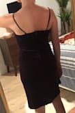 The material is so comfy and cozy! How rare is that for a nice dress? It's like pajamas! You would absolutely be comfortable wearing this for hours on end. The zipper creates a dimple/pucker in the center of my booty that would drive me crazy, so I am returning the dress. I want it to be nice and smooth and tight on the rear! 

To that point, you can't see the dimple in this photo. In real life without professional lighting I think it looks and photographs flat and wouldn't give the same wow factor as in the photo. You'd have to have SO MUCH LIGHT for it to appear the rich color of the photo. - Cargo S.
