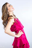I love this dress. The bright fuchsia tone makes you really pop and stand out. It's really flattering on the backside, the back is beautiful and the cut outs create contrast and balance. - InÃ©s W.