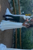 My wedding dress was absolutely perfect for our backyard wedding two weeks ago. It was gorgeous, yet not too much. I had a seamstress hem the front a little bit (it was a little too long) and add a small blingy belt which made the dress pop. Everyone raved about how beautiful I looked and how gorgeous my dress was. To be able to order a dress online (the only one I even tried on) and have it fit so perfectly was amazing!! I'm so, so happy with Lulus!!!
p.s. these pix aren't the greatest, just from family as we don't have photographer pix yet. - Barbara B.