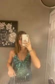 This dress is seriously adorable, I love the color. However it is way to big. I ordered a small and It fit like a medium, the straps were too big and the waist was too baggy. If you do order this dress, order a size down than usual. But if you do that, you should be fine at this dress would be beautiful!! :) - Mady P.