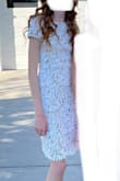 i love this dress!! it is so modest! the length is JUST above my knees which is perfect because I'm very tall so that rarely happens, i wore this dress for homecoming but I feel like i could also wear it to a wedding or to church. i love the back, first of all it had a zipper which is nice (although mine would get stuck a bit) and i love the detail in the back on the neck. it just adds a little spice to the dress! the dress was a little bit big on me but I'm very tall and skinny so it makes sense. we just sewed it a bit on the sides and it worked great! i highly recommend this dress. - Emmy H.