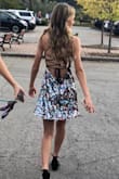 This dress is stunning! My daughter is tiny and it was nice to be able to pull the ties tight. In doing so I would say the only issue is the tiny gap that it creates at the low back but not enough to be indecent. The length was perfect and it fits great for a smaller chest. Great quality and she loved this dress! - Erica P.