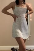 It has a liner so I don't have to wear a bra. It's a true white, I thought it would be a little bit more of a cream color based on the pictures- but I still love it as is. I wore it to homecoming with a blazer. - Sabine H.
