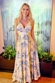 Gorgeous and romantic summer dress. I'm normally an XS but I sized up to a S since I am 5 months pregnant. Still, it wouldn't quite zip over my ribs. Sizing up further would have been too big/frumpy everywhere else, so I zipped as high as it would go and then strategically placed the waist tie over the gap and pinned it there. 

My sizing is different now of course, but my standards are: 5'6" tall, 118 lbs (126 pregnant), 34C/D bust (depending on bra brand), 25" waist, 34" hips. I wore wedge heels with this dress that are 3.5-4 inches high. - Nikki J.