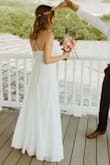 This dress was absolutely perfect for my boho wedding. I originally ordered a small because that's what I usually where, but it was too loose so I had to return it and get an x-small. The x-small fit perfectly! I only had to get the skirt hemmed a little bit because it was too long. It was pretty comfortable, not see-through, and I got so many compliments on it. I highly recommend this dress for the quality and the value. - Hazel B.