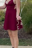 I loved it a lot, it was exactly what I wanted though I would get a strapless bra/sticky bra to hold the girls together. it was only large on the upper half of my body but other than that it was simple and beautiful - Andrew M.