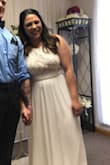 I had ordered and tried on a few dresses but with a 2 week time line we were in a crunch. I am pregnant so finding something I would be comfortable in was difficult until I found this dress. A friend recommended this site to me and I was able to order it and get it in 2 days! I did have to get it altered because I am short but it came in on a Tuesday and was altered to my height by Thursday and ready for our wedding that Saturday. The reviews helped so much. Definitely worth it! - Ashley C.