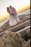 Due to work and relocating I planned my entire wedding online. I purchased 4 wedding dresses. I tried this on last and immediately fell in love. You will not be disappointed. I received so many compliments. It looks very elegant and made me feel as though I was a princess walking on cloud nine with my prince. Best decision ever!! - Freda D.