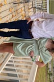 I had to size up, I'm a medium in everything, but a large fit perfectly, and is very flattering. The color is so flattering and the material is so nice. I wasn't sure because it's different, but it was the perfect dress. Very comfortable too. An amazing dress I got compliments on all night at homecoming:)) - Bella D.