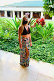 These pants are so fun!  Wore them in Hawaii and got lots of looks and lots of compliments.  The leg slits go all the way to the hips - so when you sit down, if feels kinda like you are in swimsuit bottoms. Fit is true to size.  I'm usually always a medium and these fit perfectly.  There is zero stretch in the waist; keep that in mind when ordering.  The top I'm wearing is also from Lulus. - Jamie S.