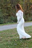 This dress is simply perfect. It fit like a glove with all the stretch! Comfy, beautiful, elegant and that price tag though! Be sure to take advantage of the 15% off first order. What a steal! I will be shopping with Lulus again now that I know they carry more than wedding dresses. I'm in love with my wedding dress! Thank you Lulus! - Christina F.