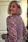 Perfect fit. Shirred top detail accentuates waist. High collar is classy. The shorter length adds a flirty factor. I received many compliments. - Lacey B.