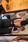Wore this in a wedding as a bridesmaid and it was a hit. Business in the front, party in the back. Hugs you in and the material is awesome. Did have to get it hemmed but par for course with my height. Hope I can find a reason to wear it again. - Anya K.