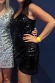I've bought this dress in green and now black sparkles! I love that it fits my figure while leaving room to eat/drink for the night. It's super flattering and not too short. Definitely my go to dress! - Cassidy R.