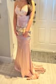 Runs a little large, usually a size 4 but ordered a 2. Had to get dress hemmed because I am short. It's a beautiful dress, stretchy material and very comfortable! Wore to a wedding. Would definitely recommend. - Isel H.