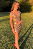My daughter picked this dress for Homecoming. She is very thin and lean, so we had to have the dress altered. We had the straps shortened, the length shortened about 2 inches and the waist taken in about an inch or two. It ended up fitting great after that. She said it was comfortable and she looked great in it. - Emily S.