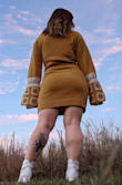 The fabric is a little itchy but it looks lovely and is good for breezy, cool afternoons. - Amber R.