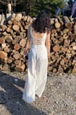Loved this fit for my rehearsal dinner outfit. Definitely made a statement and felt great! Love the material and flow. It was definitely a bit long even with heels, but at my height I expect that. Loved it anyways. - Elizabeth S.