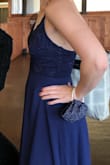 I bought this for a friend's wedding last minute, the bodice fit perfectly, the fabric was beautiful, and adjustable straps were great for the smaller chested ladies. The only downside was the length and not having time to get it hemmed& still long with 3" heels. I would definitely order it again but would plan farther ahead and make accommodations to get it altered. - Erin A.