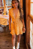 Perfect for cute summer/fall outfit! Love the fit of it, just be a bit careful might have a nip slip. Very comfy and flowy. Its a must, you must buy it! - Nova W.