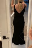 This dress is absolutely beautiful! Fits perfectly and shows off your curves. The material is supportive and has a nice lining. I was looking for a dress for a formal wedding and it was between this one and another Lulus dress. I chose the other but kept this one for the future! Picture is of me trying it on and not all done up. - Trisha C.