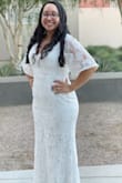 Wore this dress for my courthouse wedding and it was PERFECT. I'm in between sizes 6/8. I wore heels and the length was just right. Was a bit tight in the bust area, but I'm glad I chose a medium. - Angelina B.