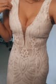 I bought this for my wedding next year and wow, it is perfect. I decided to take the risk of ordering online and I'm glad it did! Definitely order 1 size down for the perfect fit. - Hannah S.